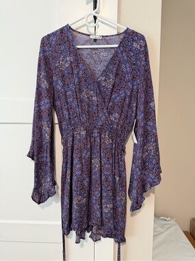 Women’s purple floral pattern dress size small NWT
Brand Wild moss